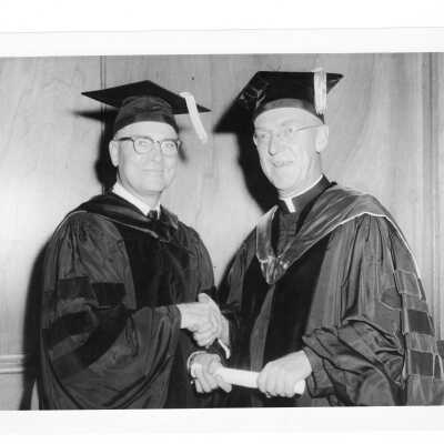 J. Joseph Bluett, S.J., with honorary degree recipeint Albert J. Nesbitt at October 1959 graduation/commencement.