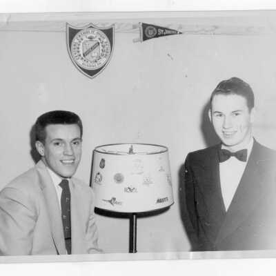 Two students of Barry Hall in dormitory room.