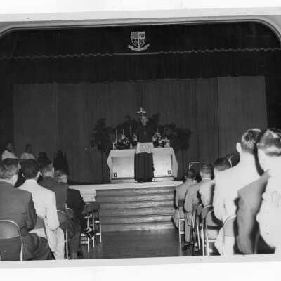 Students attending mass in Flanigan Auditorium.