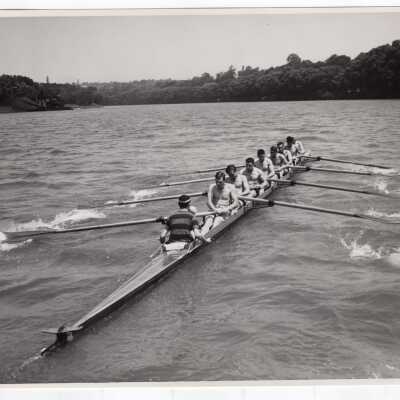 Men's crew/rowing team practicing on Schuylkill River.
