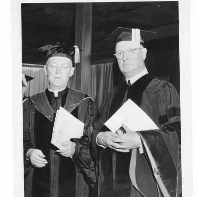 J. Joseph Bluett, S.J., with honorary degree recipeint during 1960 graduation/commencement.