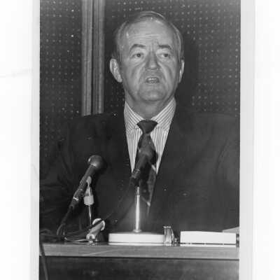 Vice President Hubert Humphrey seated at table speaking during his visit to SJC campus, January 27, 1970.