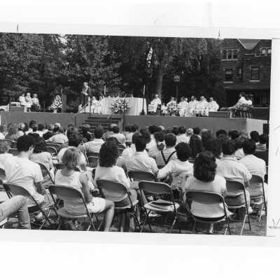 Nicholas S. Rashford, S.J., giving homily during Mass of the Holy Spirit held outside near Wolfington Hall, September 1987.