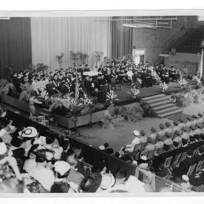 View of 1955 graduation/commencement ceremony in Field House.