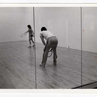 Students playing raquetball in sports/recreation complex.