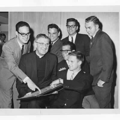Peace Corps volunteers with William F. Maloney, S.J.