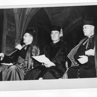 John J. Long, S.J. and two other dignitaries at 1948 graduation/commencement ceremony.