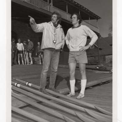Men's crew/rowing team member, Joe Mintzer, with Coach Jim Glavin, 1974.