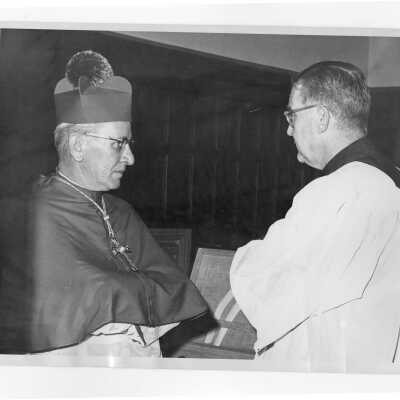 Archbishop John Krol and William F. Maloney, S.J, at Mass during Saint Joseph's week, March 1964.