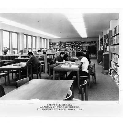Several students studying in Campbell Library, Academy of Food Marketing, Villiger (later Post).