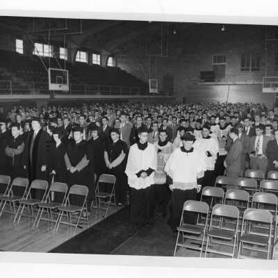 Clergy processing into Field House for Mass of the Holy Spirit, September 1950.