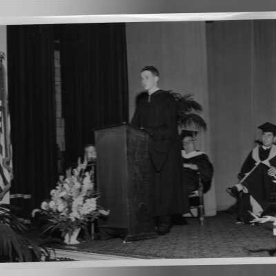 Tropaia exercises at 1955 graduation/commencement ceremony with graduating student George Prendergast giving valedictory address.