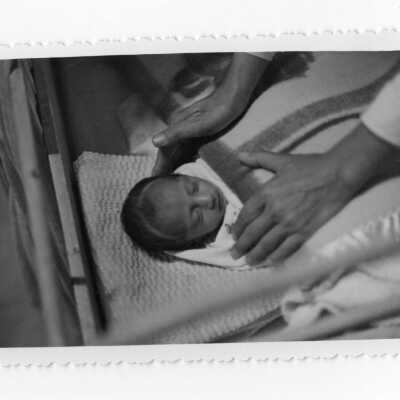 Vietnamese infant in crib, Vietnam Orphanage project.