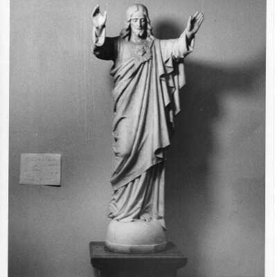 Interior view of hallway in Barbelin with statue of Jesus