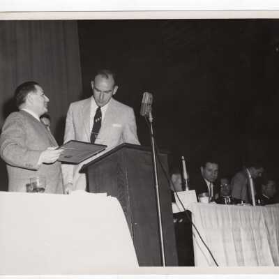 Men's Basketball Coach Jack Ramsay receiving an Alumni Award