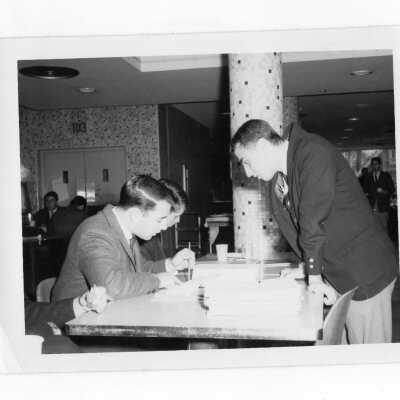 Student voting in election in Campion cafeteria.