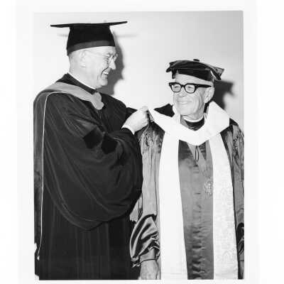 William F. Maloney, S.J., with honorary degree recipient Bishop Fred Pierce Corson, during October 1963 graduation/commencement.