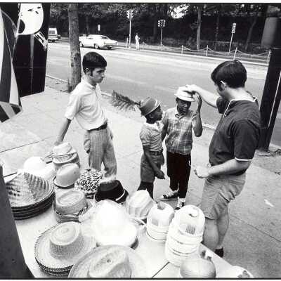 Students from "The House" or SJC Commune at 17th and Girard Streets, Philadelphia, with neighborhood children at street fair.