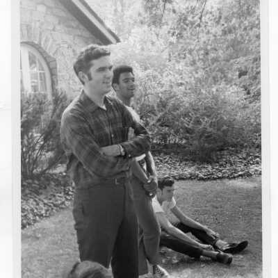 Joseph Daoust, S.J. with elementary students from 17th and Girard neighborhool in Philadelphia on SJC campus (?). This may have been part of SJC Commune outreach effort during summer 1968.