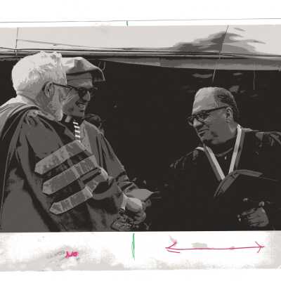 Joseph J. George receiving the Bene Merenti medal from Donald I. MacLean, S.J., and James E. Dougherty during 1977 graduation/commencement.