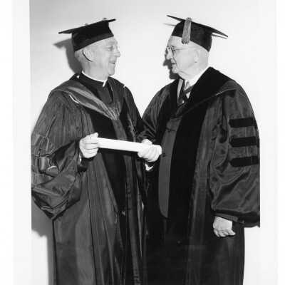 J. Joseph Bluett, S.J., and honorary degree recipient, Thomas B. McCabe at 1962 graduation/commencement.