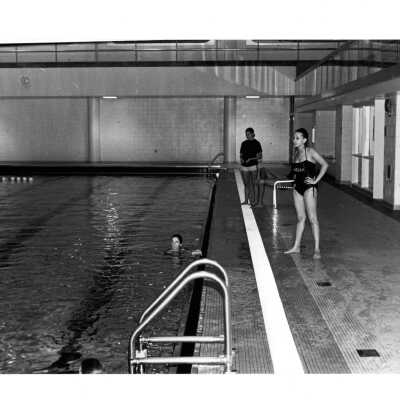 Students swimming in pool in Sports Complex.