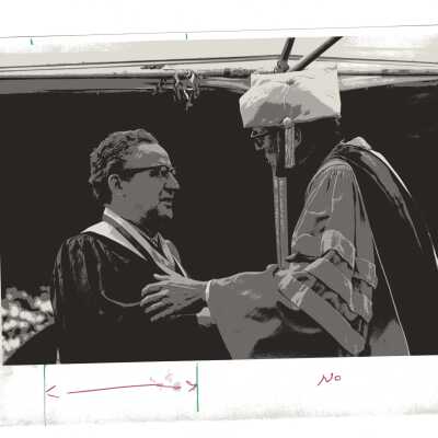 Paul R. Betz receiving Bene Merenti medal from Donald I. MacLean, S.J. during 1977 graduation/commencement.