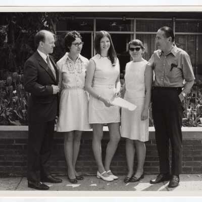 View of students and others (?)(Heckrotes, O'Doherty, Carroll, Uribe?) prior to departing for annual community service project in Colombia as part of Latin American Studies Institute Summer Service Project, 1972.