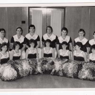 Group photo of men and women's cheerleading squad.