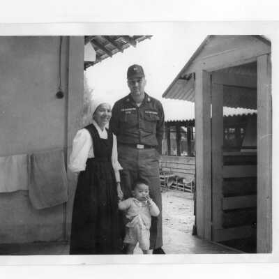 U.S. soldier with Vietnamese child and Vietnamese nun, Vietnam Orphanage project.