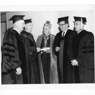 J. Joseph Bluett, S.J., with four honorary degree recipients, Thomas B. McCabe, Archbishop Egidio Vagnozzi, Richard J. Hughtes, and Myer B. Marcus at 1962 graduation/commencement.