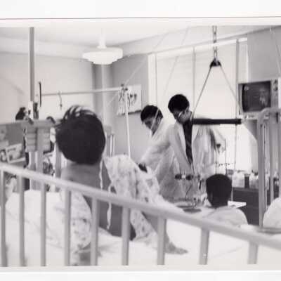 Thomas Dolan and Peter Burghart of Molloy Chemical Society conducting experiments and demonstrations for children who were patients at Children's Hospital of Philadelphia, 1971.