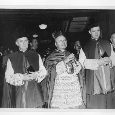 Conclusion of pontifical mass for centennial celebration held in Field House, with Monsignor Vincent Burns, Monsignor Francis Furey, John McShain, Thomas Quirk, and Amleto Giovanni Cicognani.