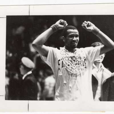 Men's Basketball player wearing victory net