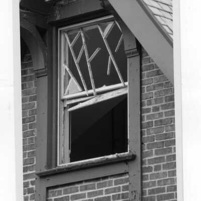 Exterior view of window of Simpson Hall after fire.
