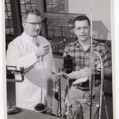 Chemistry professor, George J. Beichl, with graduate student, Harry Otterson, in new graduate studies science laboratory in Barbelin Hall, February 1958.
