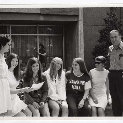 View of students (Heckrote, O'Doherty, Woods, Baldwin, Daly, Darroll, Uribe) prior to departing for annual community service project in Colombia as part of Latin American Studies Institute Summer Service Project, 1972.