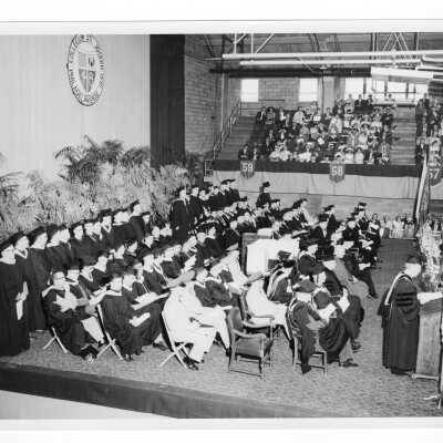 Interior view of 1958 graduation/commencement ceremony in Field House.