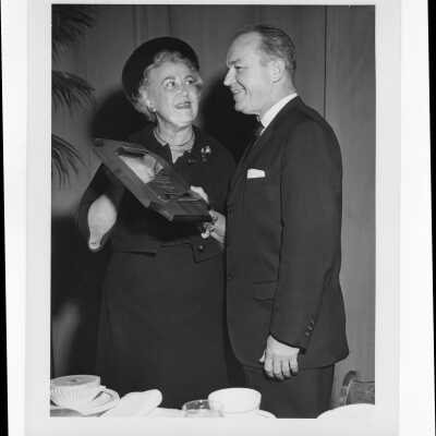 Kathryn Granahan showing Hogan Alumni Award plaque to Governor Bill Cahill, March 7, 1962.