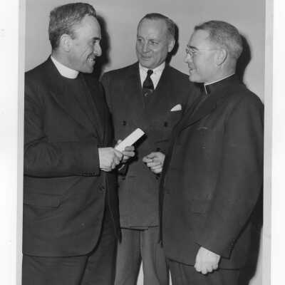 John J. Long, S.J., with John Horstmann and Bernard Hubbard, S.J., who visited SJC campus on January 16, 1948 for lecture forum.