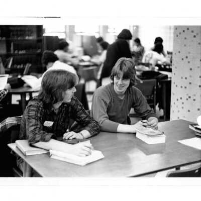 Two students at table in Drexel Library.
