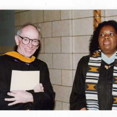 View of faculty members and administrators before the procession during 1990 graduation/commencement.