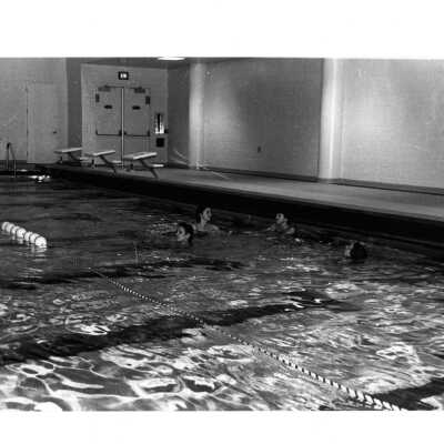 Students swimming in pool in Sports Complex.