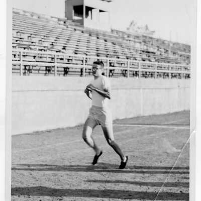 Student from Barry Hall running in track meet.