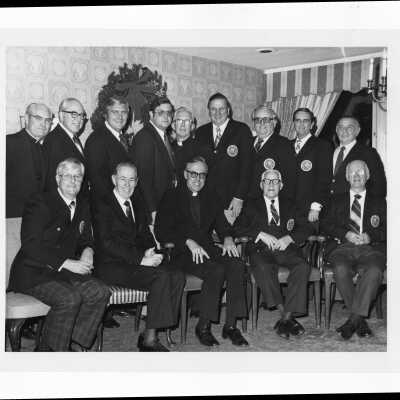 Donald I. MacLean, Michael Smith, S.J., and Matthew Sullivan, S.J. with past presidents of alumni association who have received presidential blazers, December 5, 1978.