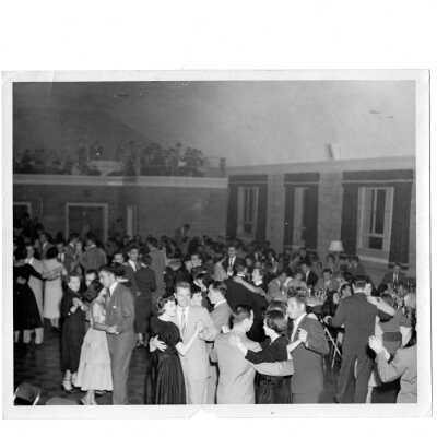 Dance during reunion of class of 1950, held September 27, 1952 in Flanigan Auditorium. Dance held to benefit McKee McLaughlin scholarship fund.