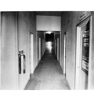 View of hallway in veterans' barracks. Barrracks located near Cardboard College also known as Barbelin Annex.