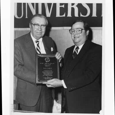 Paul E. Kelly, 1982 Hogan Alumni Award recipient, with Francis E. Wellock.