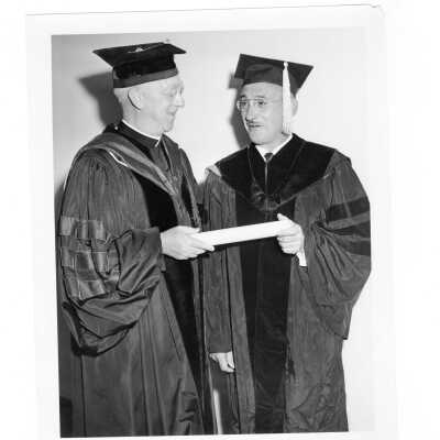 J. Joseph Bluett, S.J., with honorary degree recipient Myer B. Marcus during 1962 graduation/commencement.