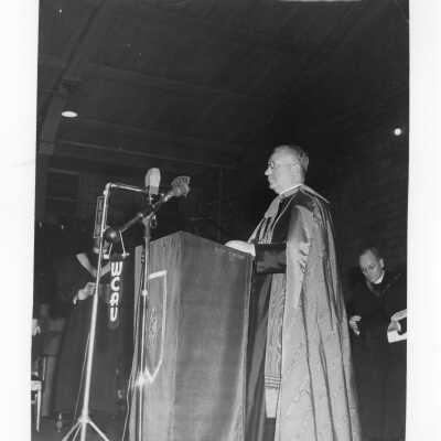 Apostolic delegate, Archbishop Amleto G. Cicognani, giving address at academic convocation, October 28, 1951, as part of centennial celebration.